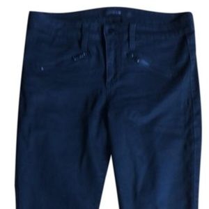 Black skinny jeans with zipper pockets